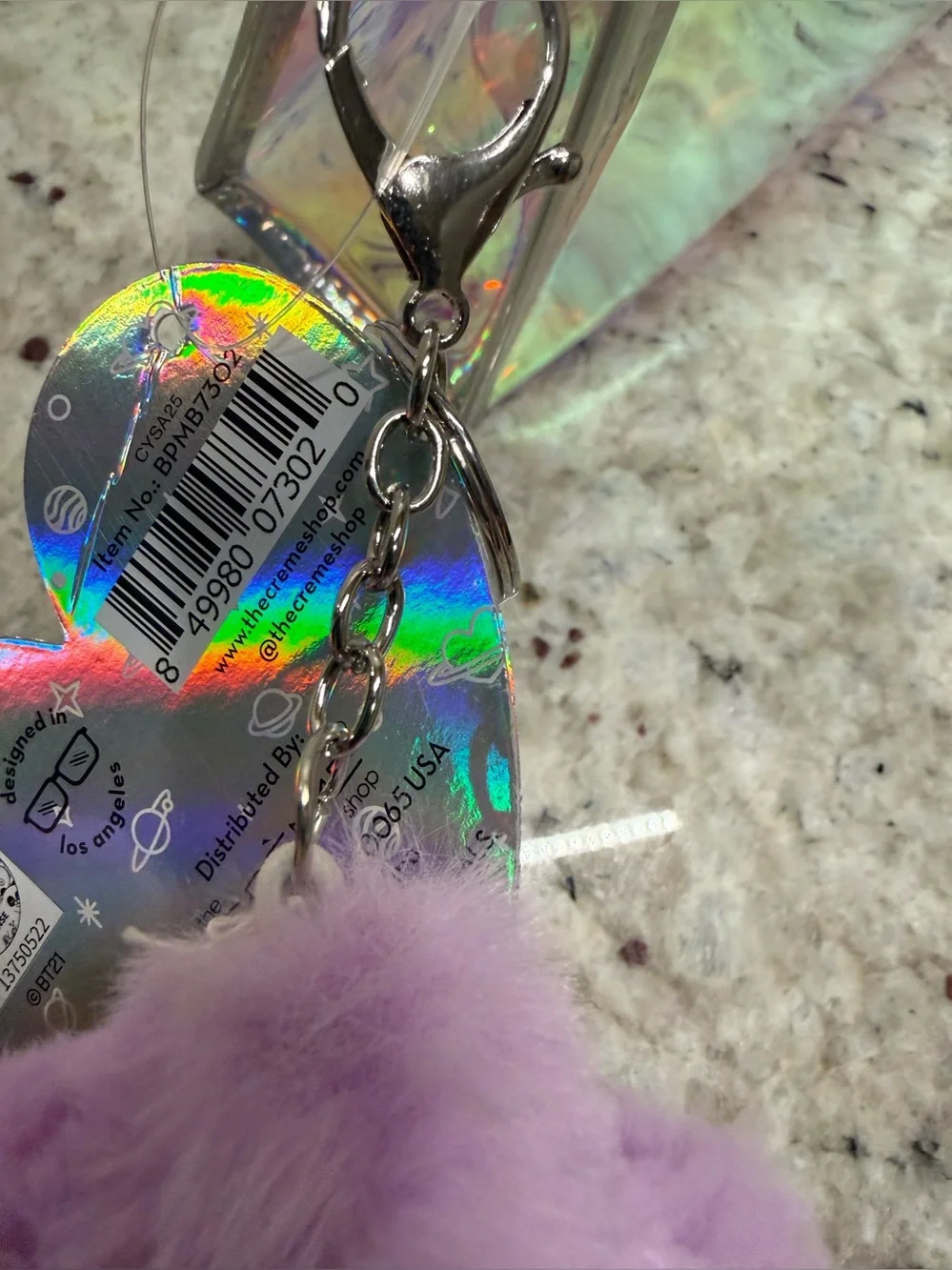 Crème Shop holographic BT21 pouch with purple fuzzy star charm NWT